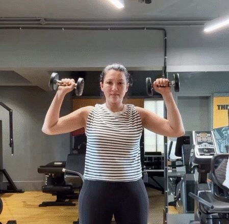 Gauahar Khan hits the gym to shed pregnancy weight, saying, “Be your own champion.”
