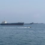 Vessel with 30-member crew reports attack near Strait of Hormuz, seeks assistance
