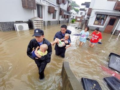 Over 95,000 evacuated as heavy rains hit Beijing