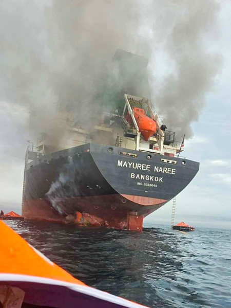 Iran’s navy says ‘violating’ oil tanker caught fire east of Hormuz Strait